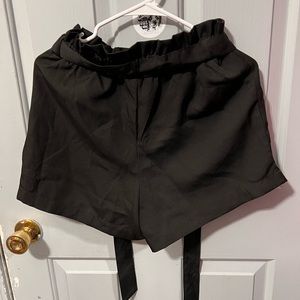 Black pair of shorts very flowly size small